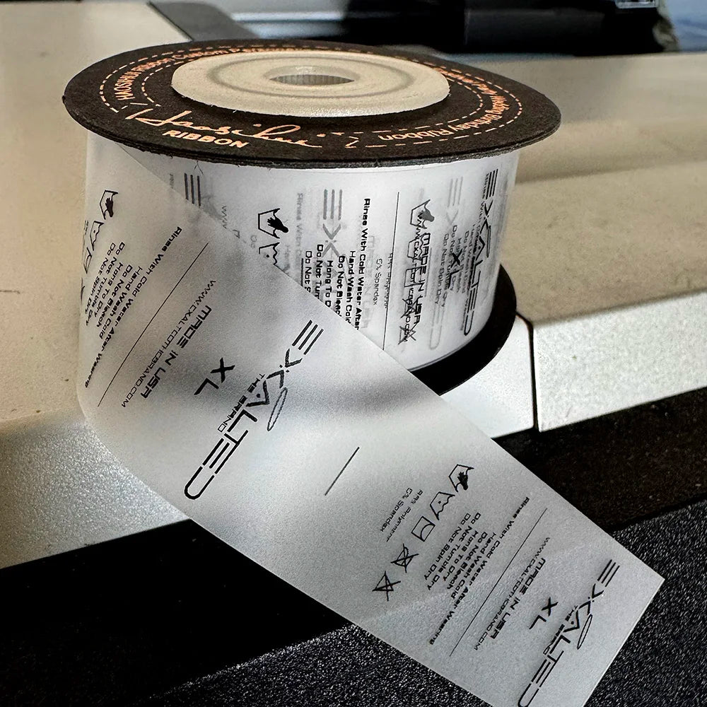 Width 30mm Custom Made Design TPU Garment Washing Instructions Care Label Satin Clothing Size Tags Washable Labels in roll